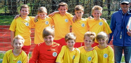 Mannschaftsfoto mit Trainer
